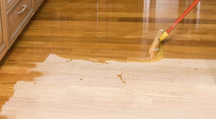 waxing a floor with mop