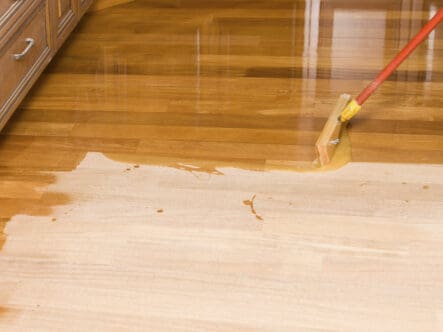 waxing a floor with mop